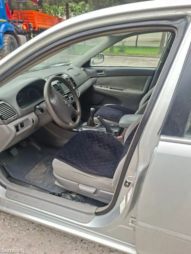 Toyota Camry 2004 · 2.4 MT