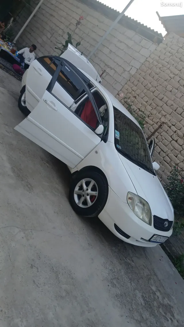 Toyota Corolla 2003 · 1.8 MT