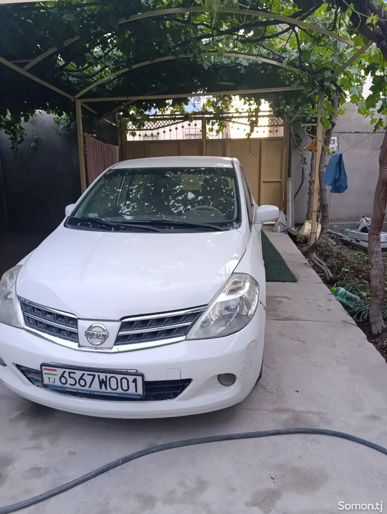 Nissan Tiida 2009 · 1.6 AT
