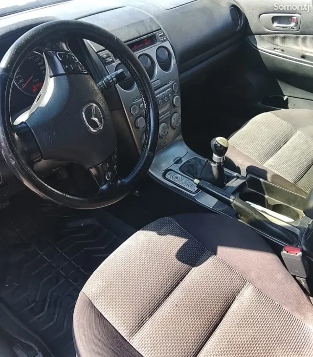 Mazda 6 2003 · 1.8 MT