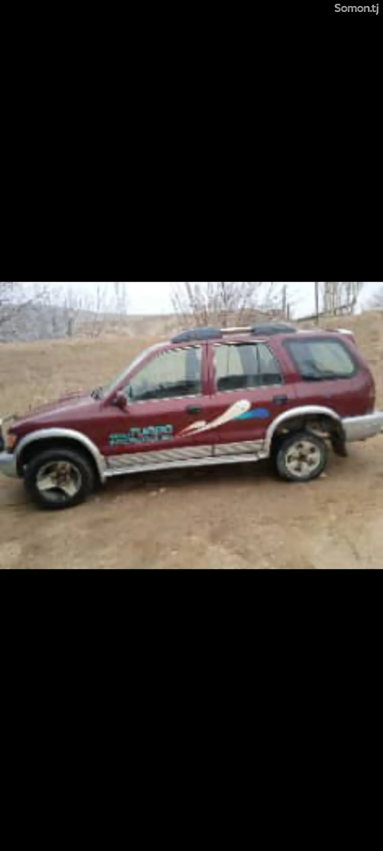 Kia Sportage 1997 · 2.0 MT