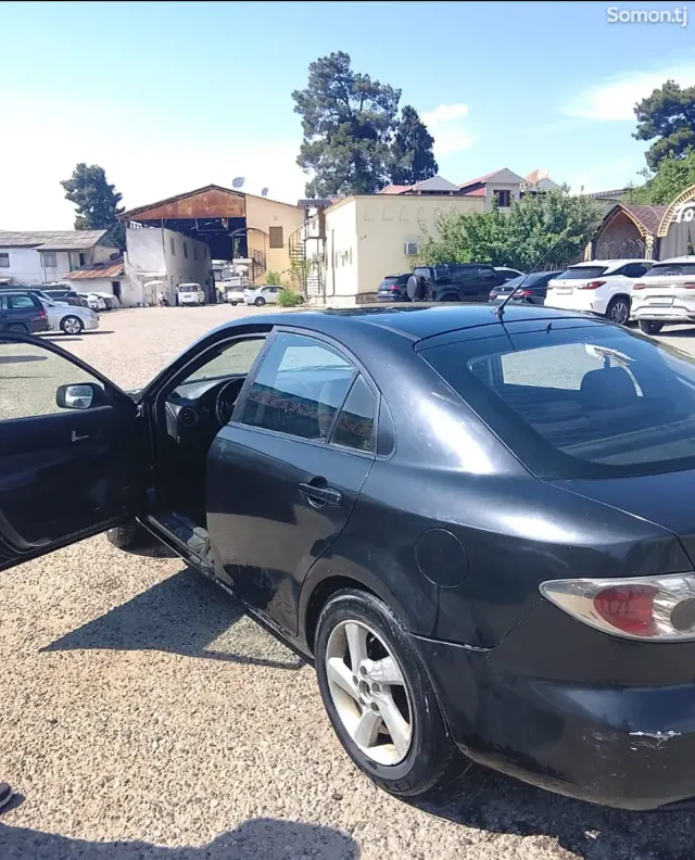 Mazda 6 2003 · 1.8 MT