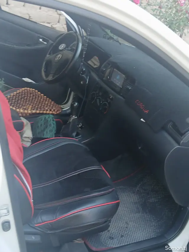 Toyota Corolla 2003 · 1.8 MT