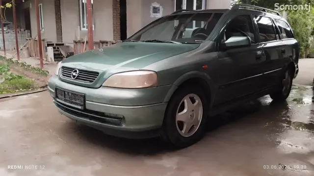 Opel Astra K 1998 · 1.6 MT