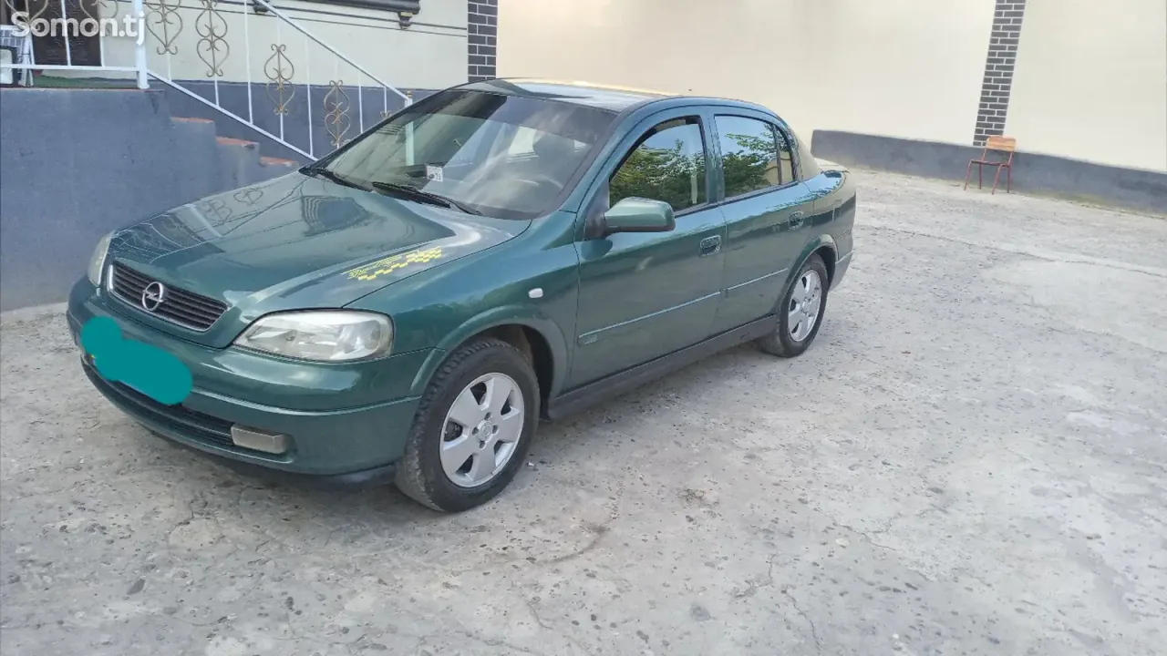 Opel Astra G 2003 · 1.6 MT