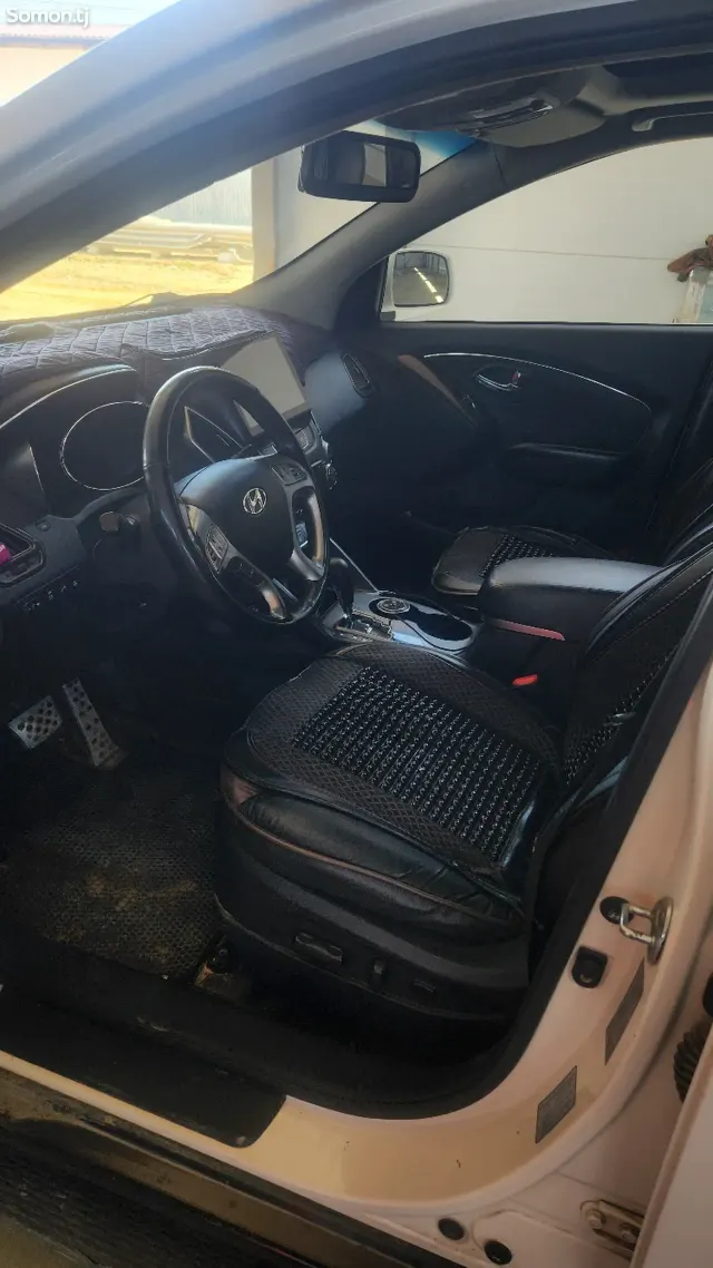Hyundai Tucson 2012 · 2.0 AT