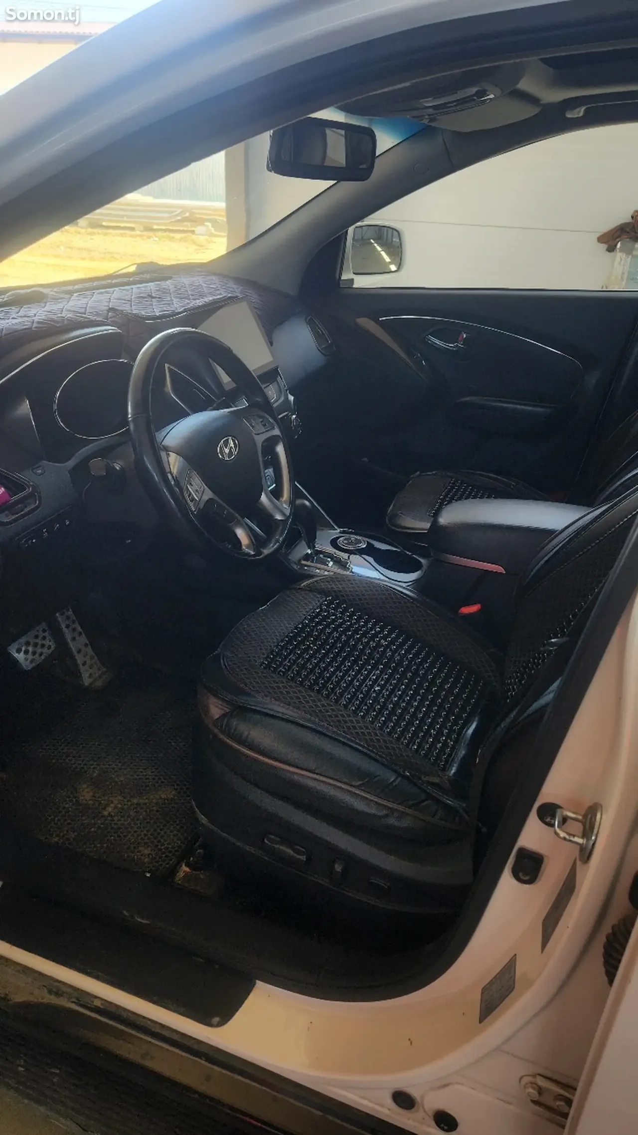 Hyundai Tucson 2012 · 2.0 AT