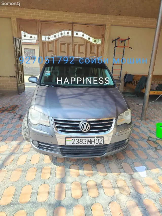 Volkswagen Touran 2007 · 1.9 AT