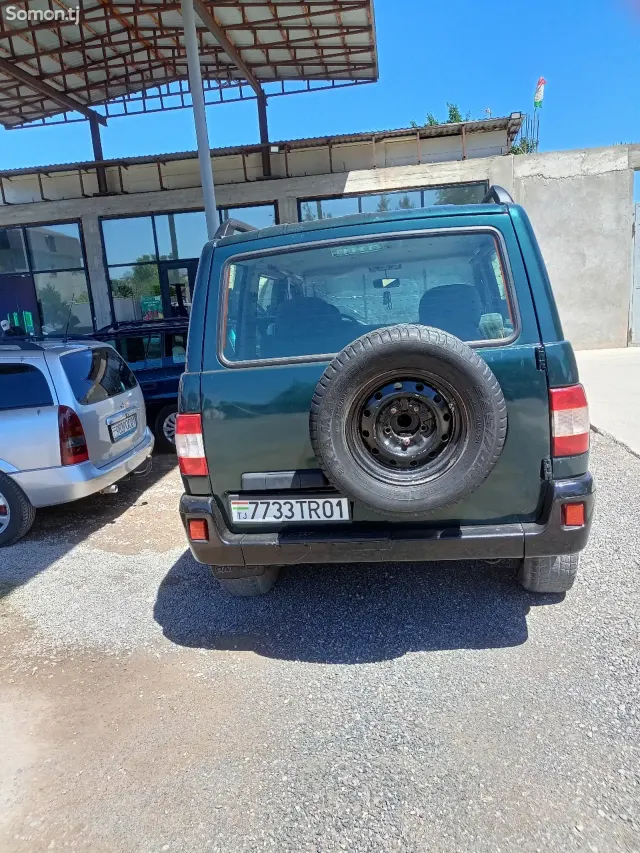 УАЗ Patriot 2009 · 2.7 MT