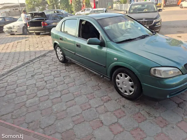 Opel Astra G 1999 · 1.6 MT