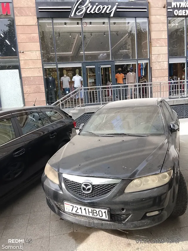 Mazda 6 2003 · 1.6 MT