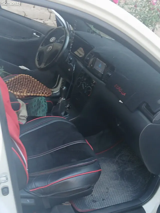 Toyota Corolla 2003 · 1.8 MT