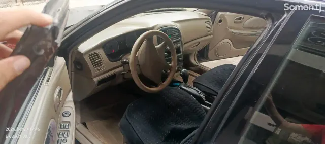 Kia K5 2002 · 1.8 AT