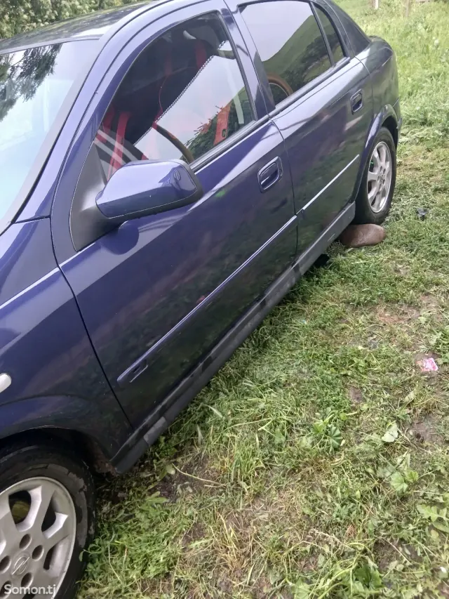 Opel Astra G 2003 · 1.8 MT