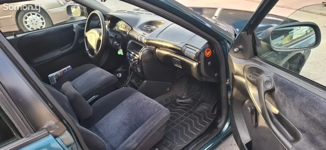 Opel Astra F 1995 · 1.6 MT