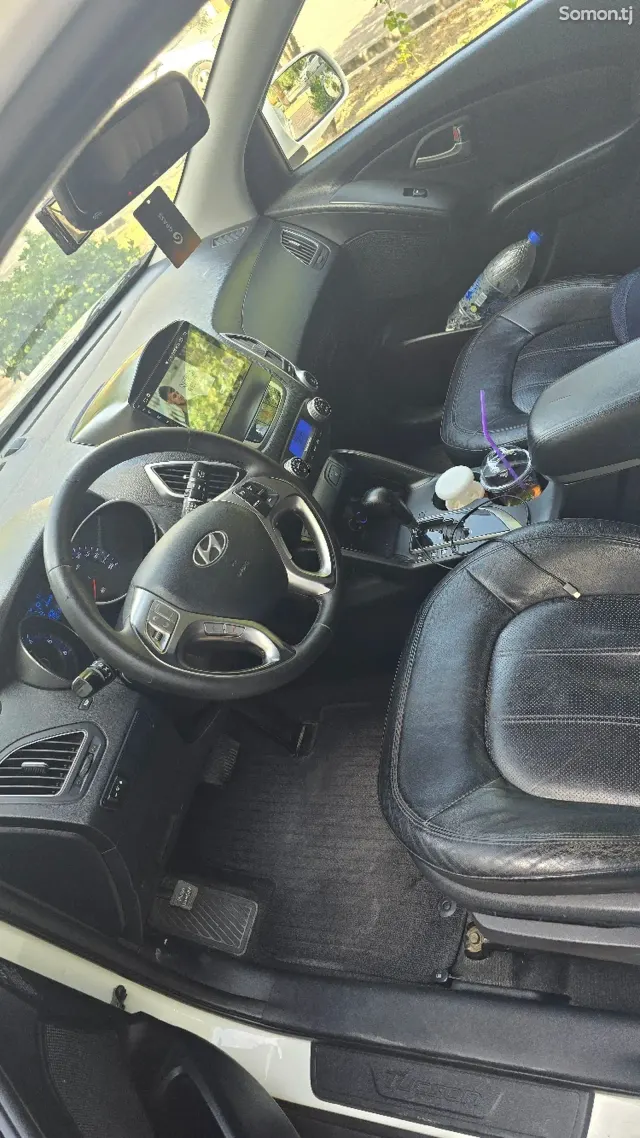 Hyundai Tucson 2010 · 2.0 AT