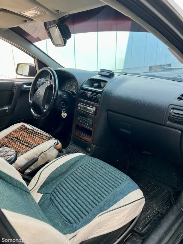 Opel Astra G 2003 · 1.6 MT