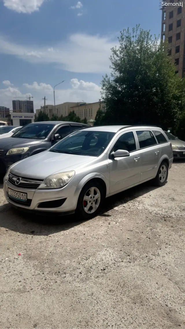 Opel Astra H 2009 · 1.6 MT