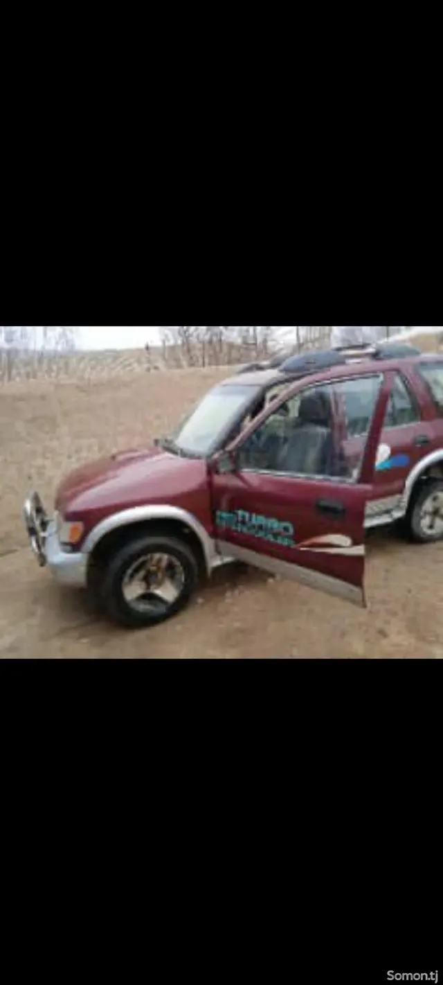 Kia Sportage 1997 · 2.0 MT
