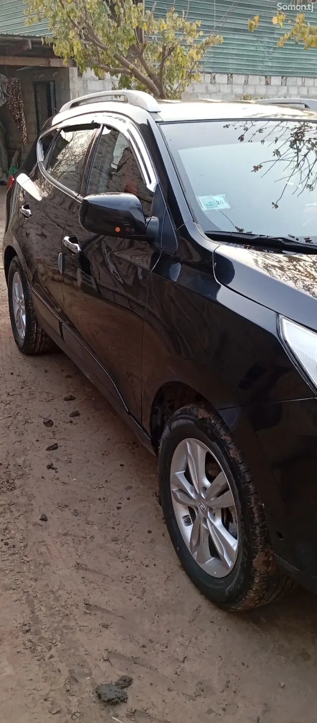 Hyundai Tucson 2011 · 2.0 AT
