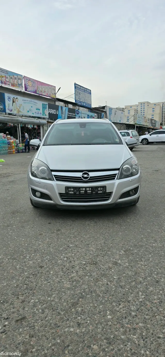 Opel Astra H 2009 · 1.8 MT