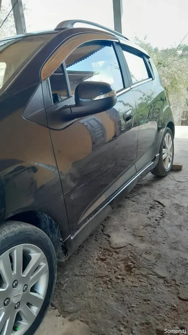 Chevrolet Spark 2014 · 1.1 AT