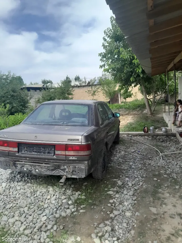Mazda 626 1998 · 2.2 MT