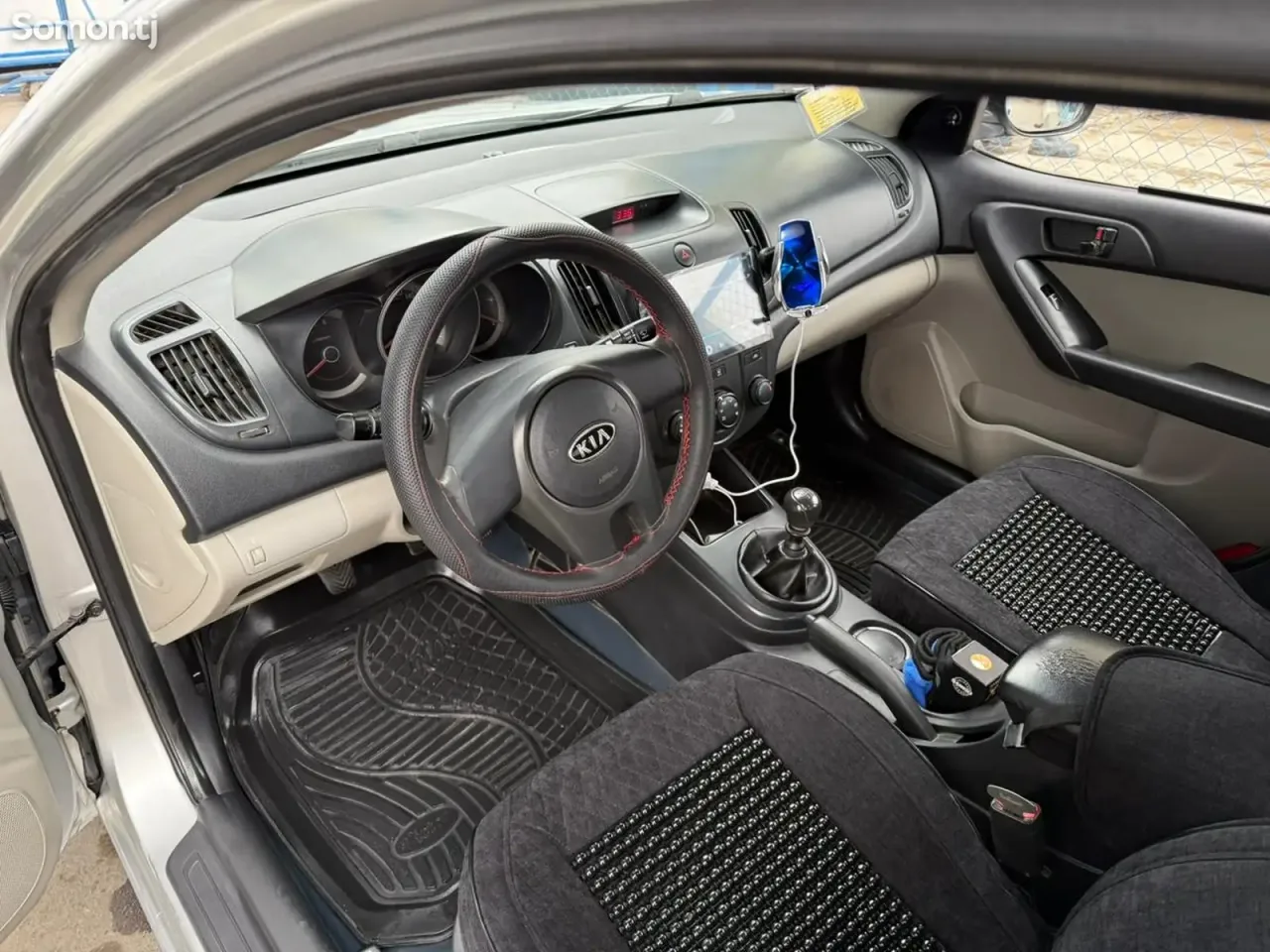 Kia Cerato 2009 · 1.6 MT