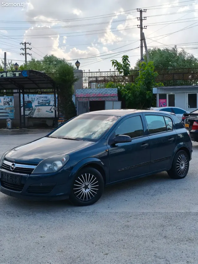 Opel Astra H 2007 · 1.6 MT