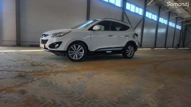 Hyundai Tucson 2012 · 2.0 AT
