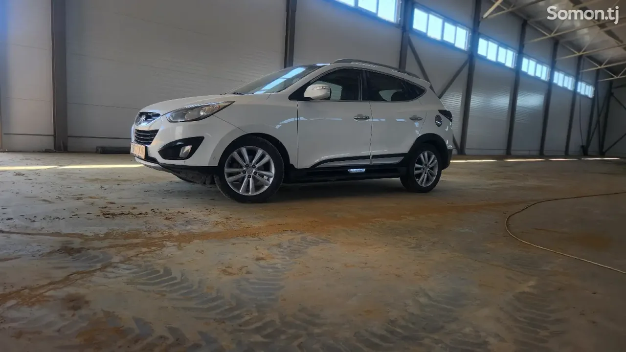 Hyundai Tucson 2012 · 2.0 AT
