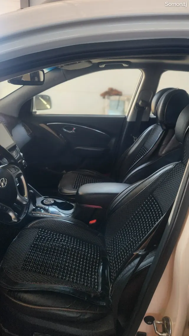 Hyundai Tucson 2012 · 2.0 AT