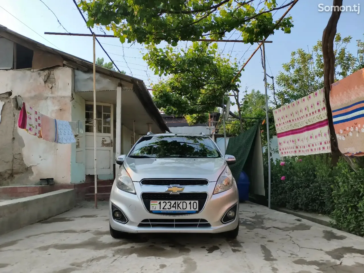 Chevrolet Spark 2014 · 1.1 AT