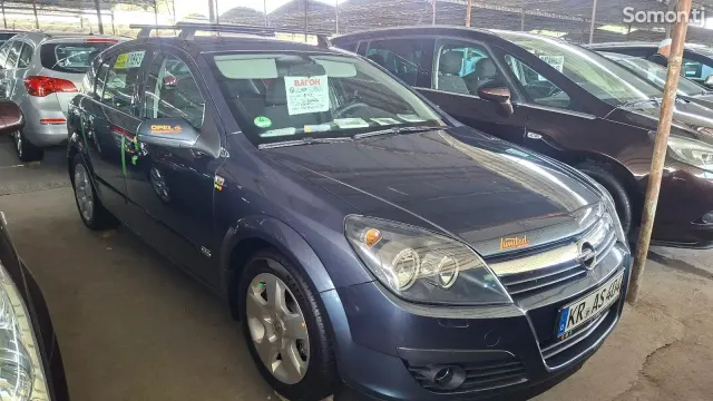 Opel Astra H 2006 · 1.6 MT