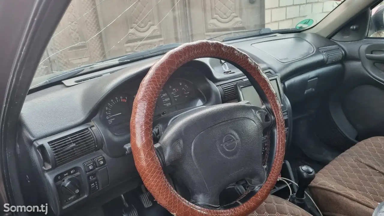 Opel Astra F 1998 · 1.6 MT