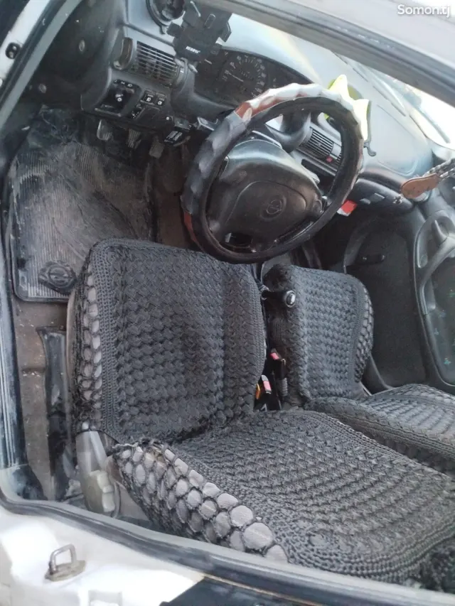 Opel Astra F 1993 · 1.6 MT