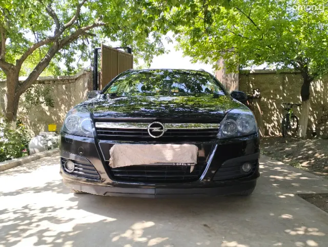 Opel Astra H 2006 · 1.6 MT