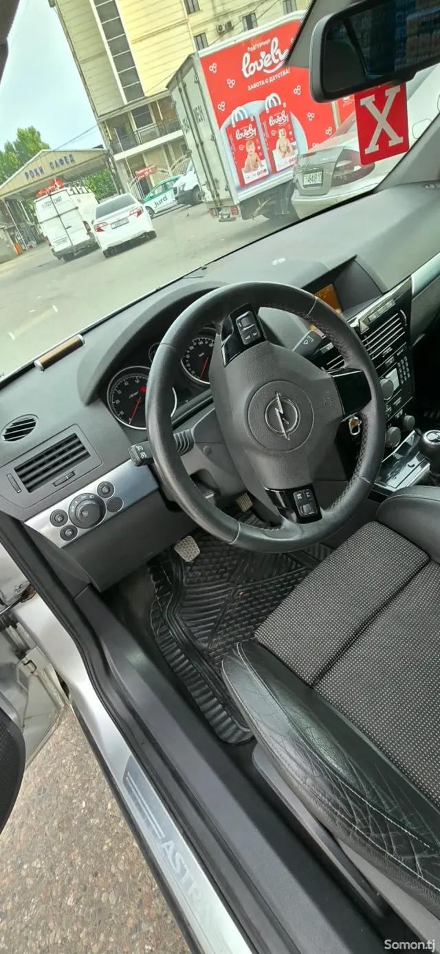 Opel Astra H 2009 · 1.8 MT