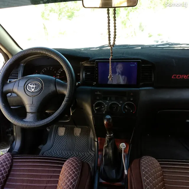 Toyota Corolla 2004 · 1.6 MT