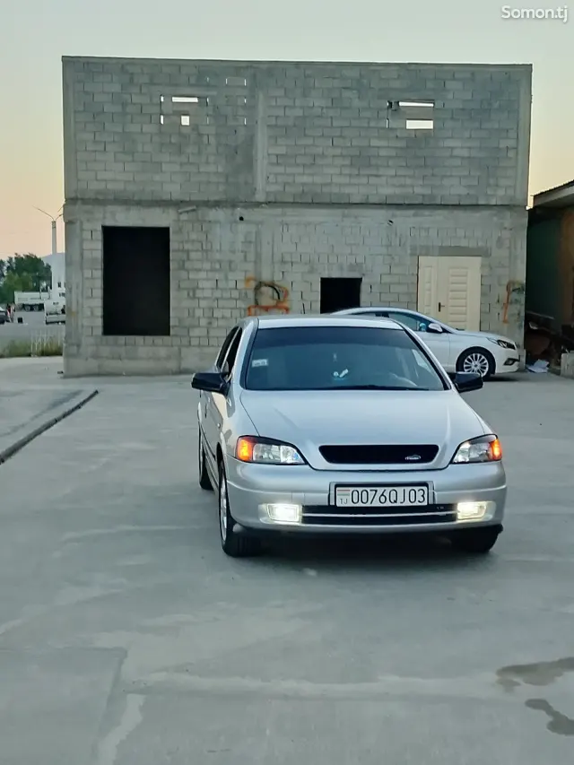 Opel Astra J 2003 · 1.6 MT