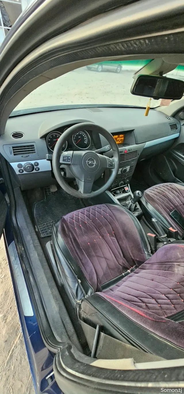 Opel Astra H 2006 · 1.6 MT