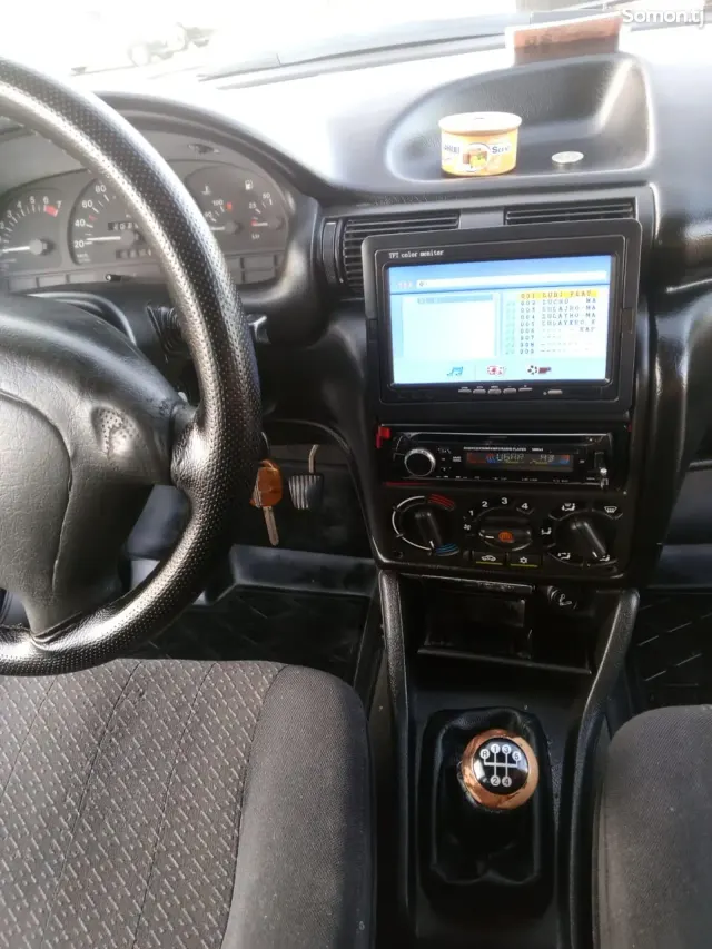 Opel Astra F 1998 · 1.6 MT