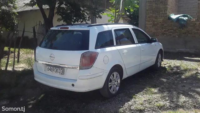 Opel Astra H 2005 · 1.8 MT