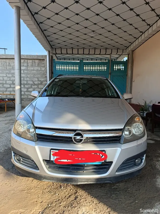 Opel Astra H 2006 · 1.6 MT