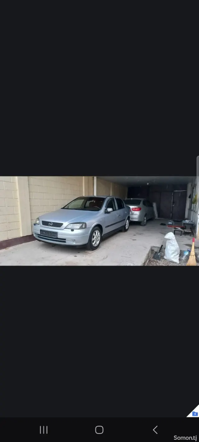 Opel Astra G 2003 · 1.6 MT