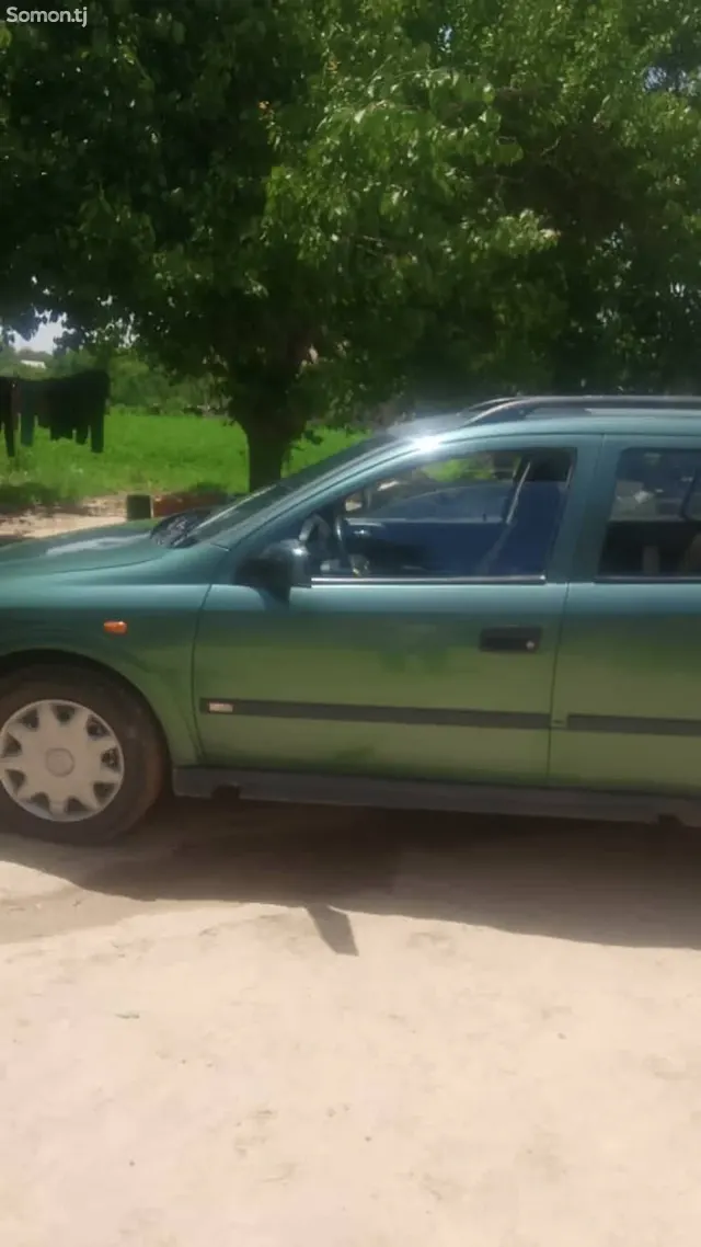 Opel Astra J 1998 · 1.6 MT