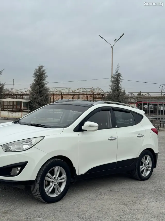 Hyundai Tucson 2012 · 2.0 AT