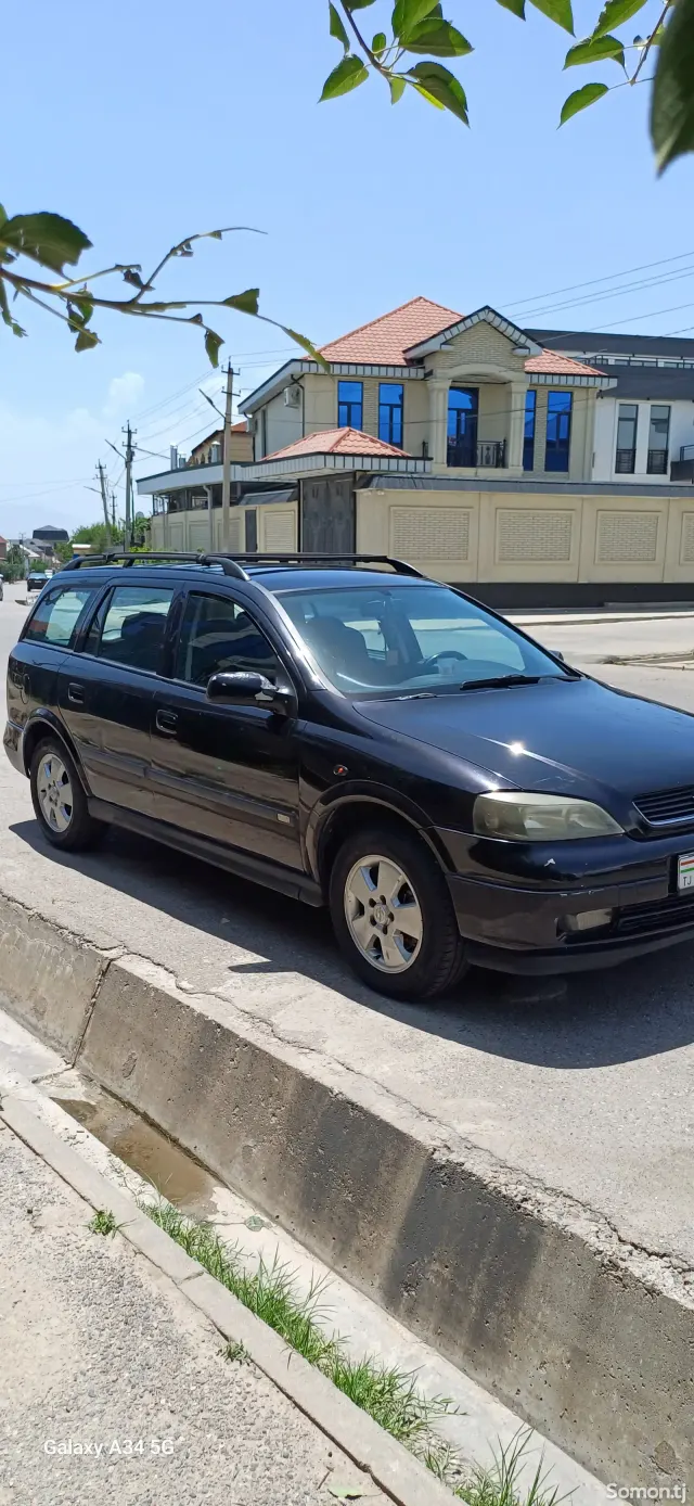 Opel Astra G 2003 · 1.6 MT