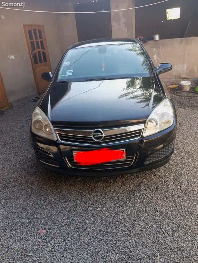 Opel Astra H 2008 · 1.6 MT