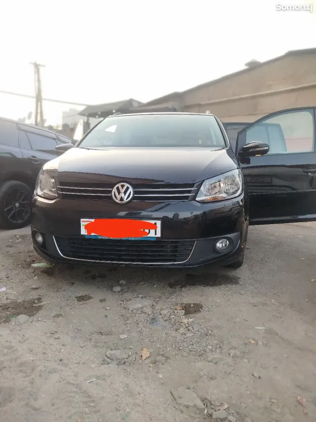 Volkswagen Touran 2014 · 1.4 AT